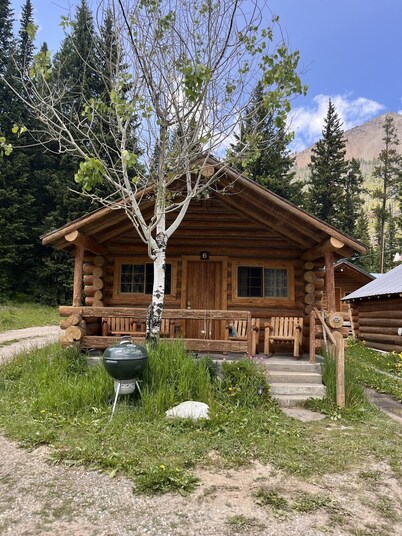 Comfy cabin is situated on the Silver Gate property which overlooks 10,000ft tall mountain peaks surrounding the town.