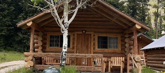 Comfy cabin is situated on the Silver Gate property which overlooks 10,000ft tall mountain peaks surrounding the town.