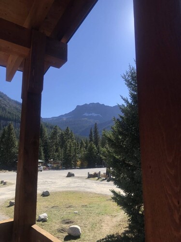 Comfy cabin is situated on the Silver Gate property which overlooks 10,000ft tall mountain peaks surrounding the town.