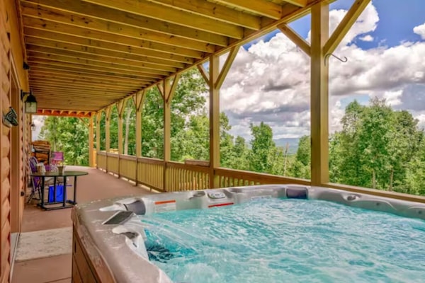 "Great hot tub w such a view. Huge backyard for exploring." -Melissa
