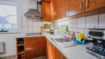 Fridge, microwave, toaster, cookware/dishes/utensils