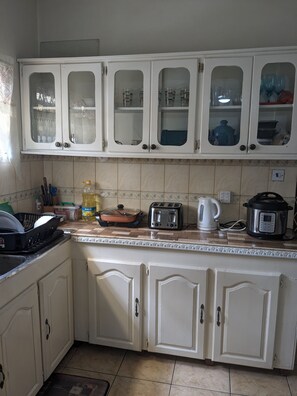Fridge, stovetop - A private two bedroom apartment shared by two renters per bedroom  (Bagotstown)