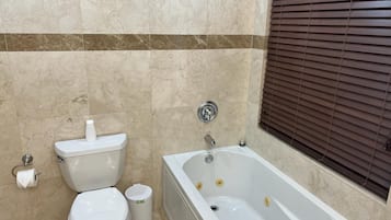 Jetted tub, towels, soap, toilet paper
