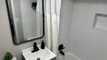 Hair dryer, towels, soap, shampoo