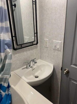 Shower, towels, toilet paper
