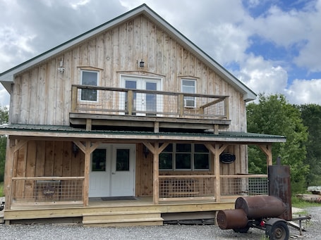 Exterior. Stay in our cozy Maple Syrup Sugarhouse at Butternut Maple Farm