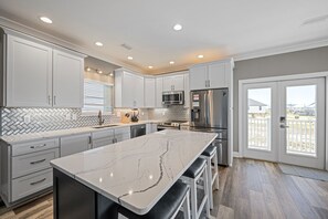 Fridge, microwave, oven, stovetop - 5BR Modern Beach Home, Steps To Beach, Balcony Gulf Views, Firepit, Dog Friendly (Gulf Shores)