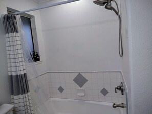 Hair dryer, towels, soap, shampoo