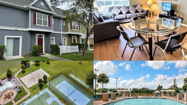 A residential house with a front yard, a living room with a glass table, a pool area with a pool and lounge chairs, and a tennis court.