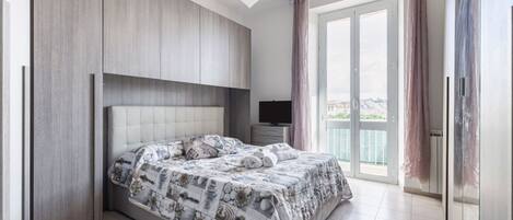 2 habitaciones, tabla de planchar con plancha, wifi y ropa de cama