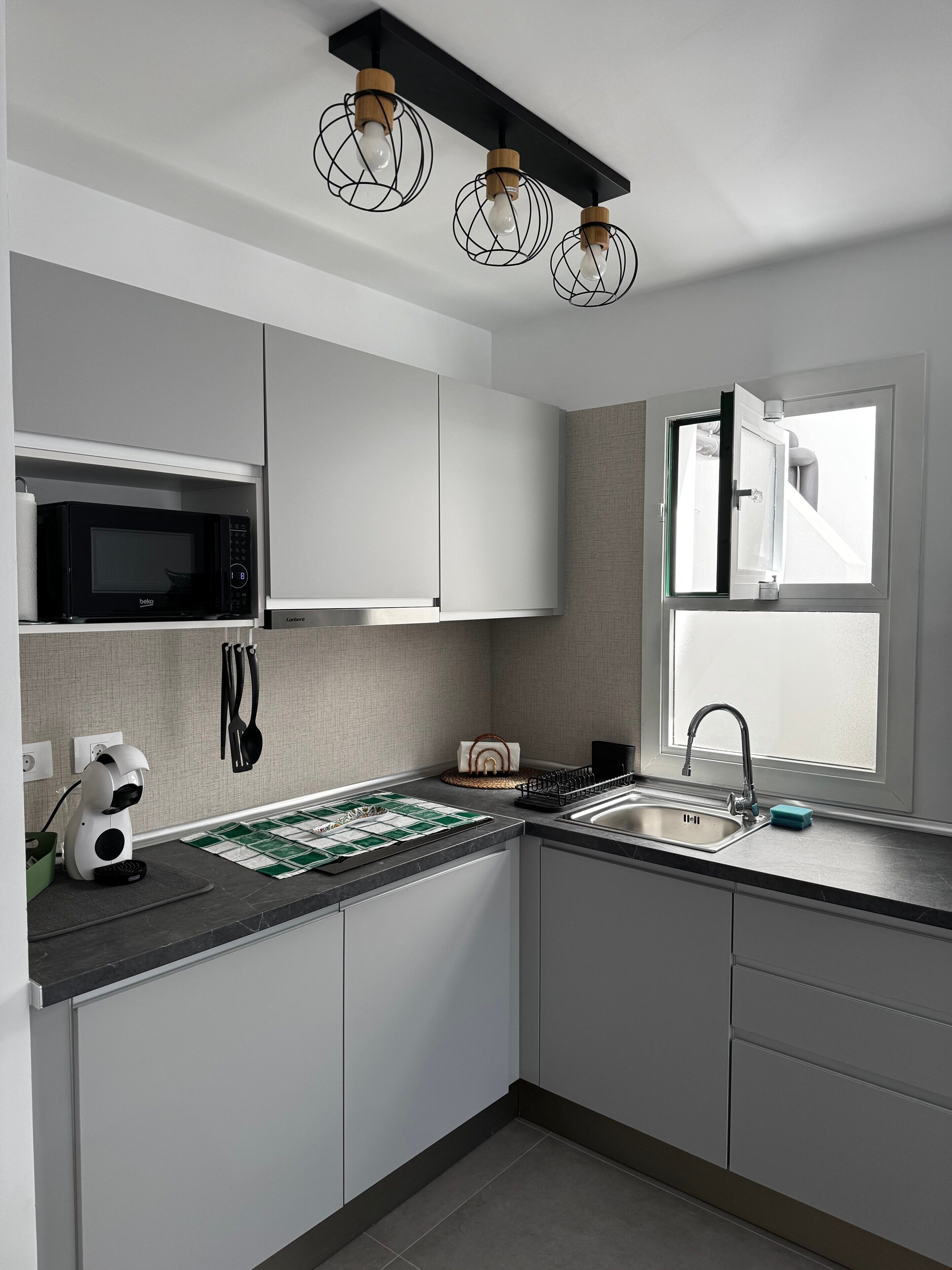 Fridge, microwave, stovetop, coffee/tea maker