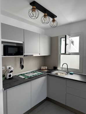 Fridge, microwave, stovetop, coffee/tea maker - Holiday Apartment 'Sally’s Nest' (Puerto Rico)