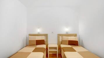 1 dormitorio, tabla de planchar con plancha, wifi gratis y ropa de cama