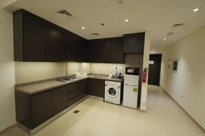 Private kitchen - Studio Apartment Near Sharaf DG Metro Station (Dubai)