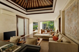 Villa, 1 King Bed, Pool View | Living area | 40-inch LCD TV with satellite channels