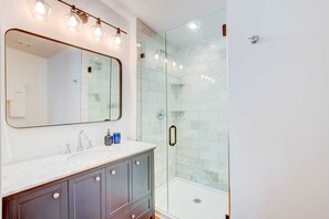 Shower, hair dryer, towels