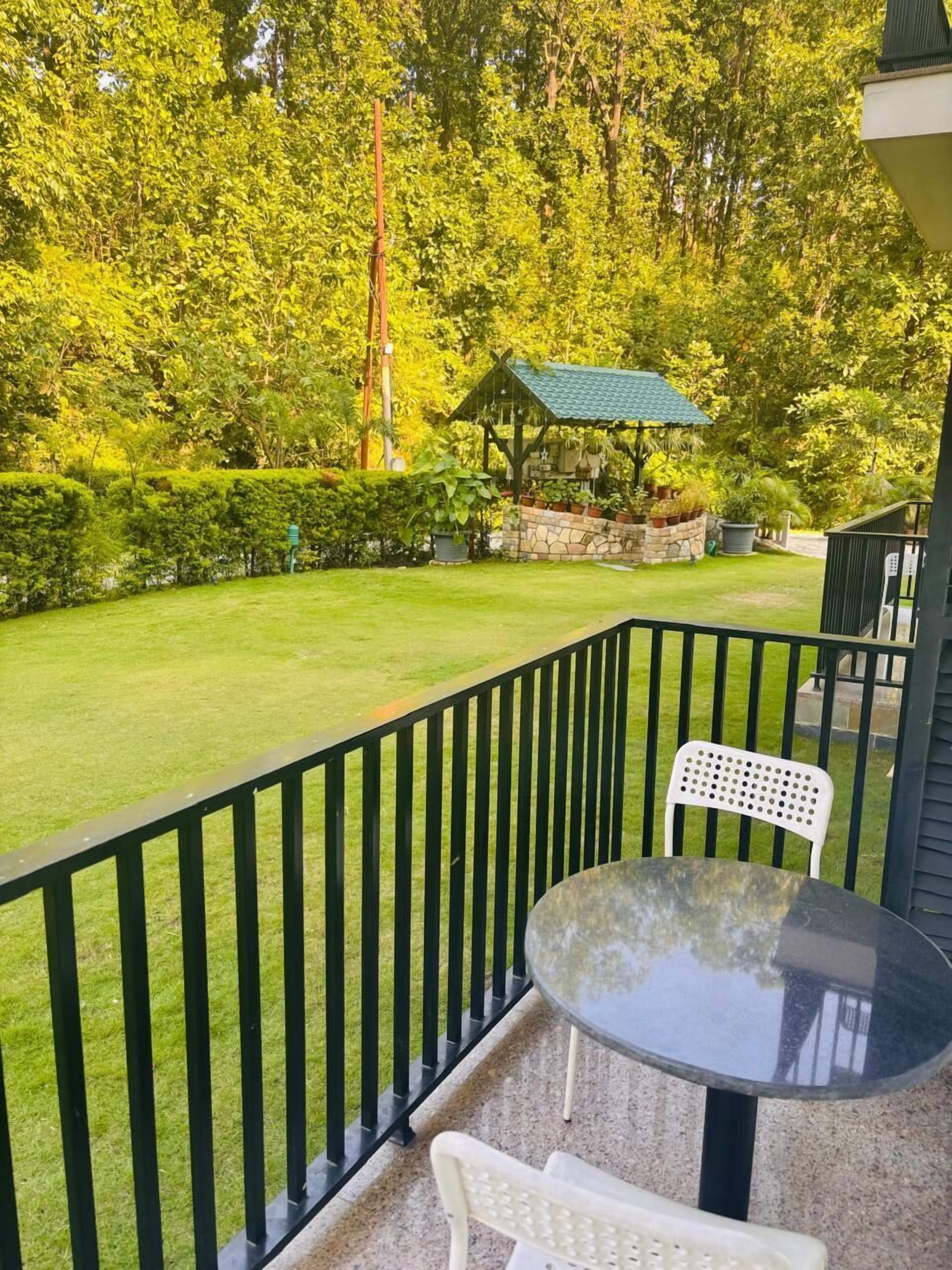 Garden Room  with Balcony | Garden view