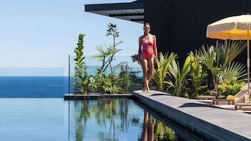 2 outdoor pools, open 8:30 AM to 5:30 PM, pool umbrellas, pool loungers