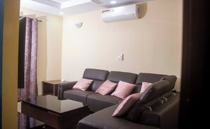 House, 2 Bedrooms, Smoking, Balcony | Living area - Kadoued Furnished Apartment 2 Bedroom (Ouagadougou)