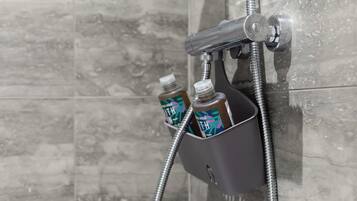 Shower, hair dryer, towels, shampoo