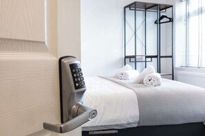 1 dormitorio, tabla de planchar con plancha, wifi gratis y ropa de cama