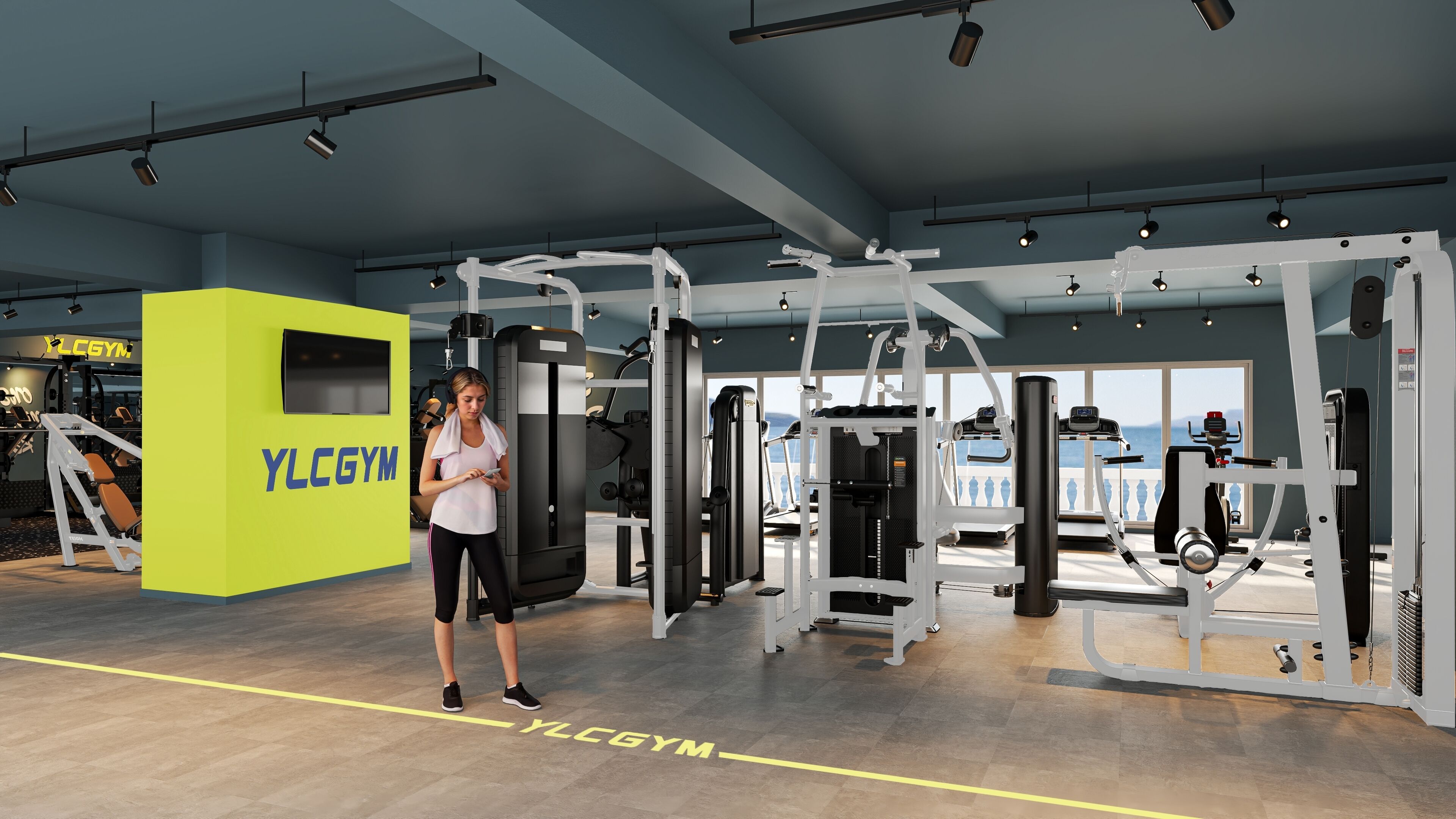 A gym with exercise equipment, a bright yellow wall with "YLCGYM" text, and a view of the sea through large windows.