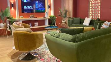 Design Townhome | Living area | 80-cm Smart TV with digital channels, Netflix, streaming services