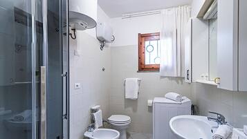 Standard Townhome, Multiple Bedrooms (3 Le Perle Di Stintino) | Bathroom | Shower, hair dryer, bidet, towels