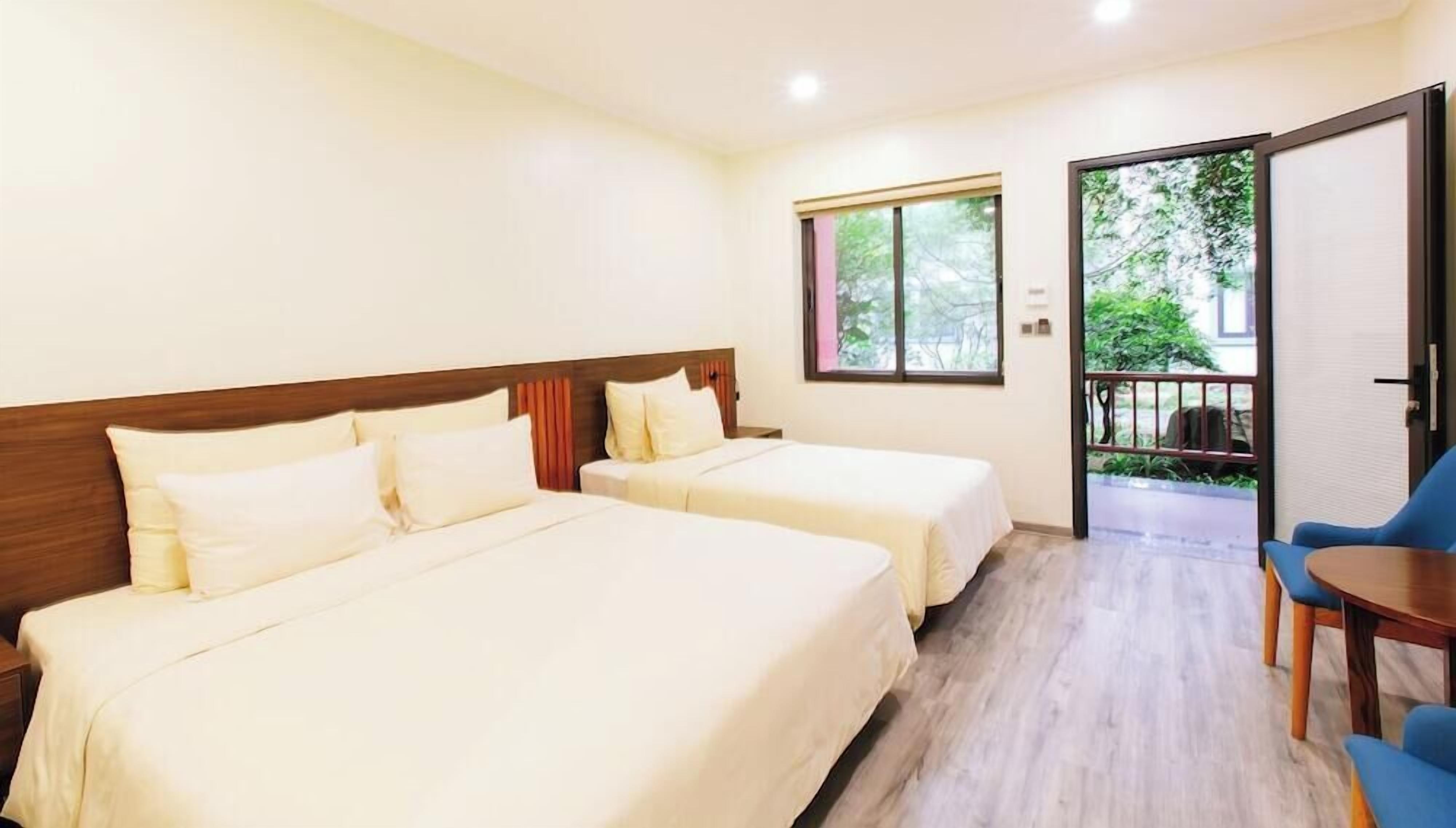 Premium bedding, free minibar items, desk, laptop workspace