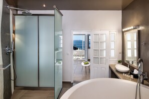 Honeymoon Suite private balcony sea view | Bathroom | Hair dryer, bathrobes, slippers, towels - Lava Stone (Santorini)