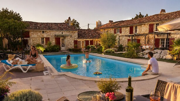 A pool area with stone buildings, lounge chairs, and a table with drinks and snacks. - "carpe Diem" en Albret, Magnifique Longère Avec Piscine et Grand Terrain Clos (Espiens)