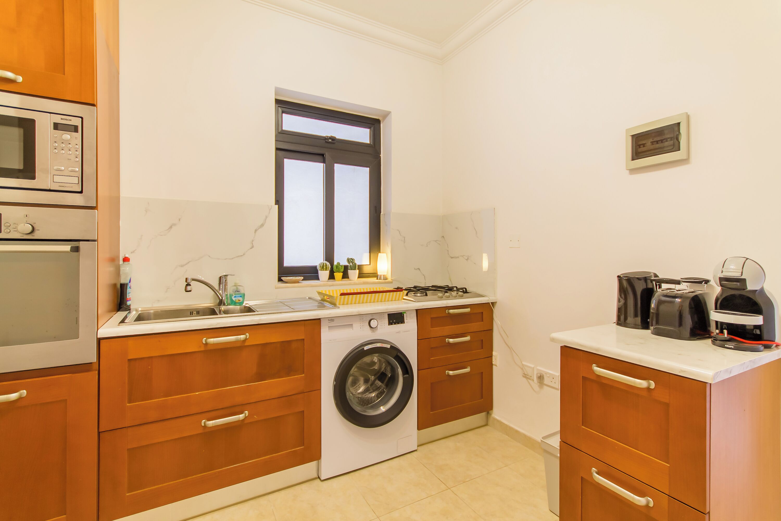 Family Apartment, Multiple Bedrooms, 2 Bathrooms (A Lovely Apart By The Sea Sliema) | Private kitchen | Fridge, microwave, stovetop, coffee/tea maker