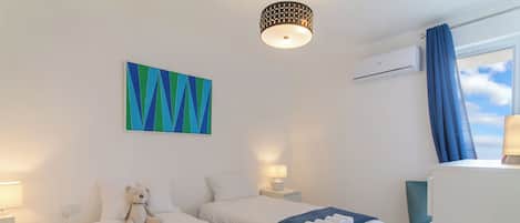Family Apartment, Multiple Bedrooms, 2 Bathrooms (A Sunny Penthouse Modern 2 bdr -) | 2 bedrooms, iron/ironing board, free WiFi, bed sheets