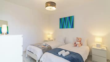 Family Apartment, Multiple Bedrooms, 2 Bathrooms (A Sunny Penthouse Modern 2 bdr -) | 2 bedrooms, iron/ironing board, free WiFi, bed sheets