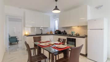 Family Apartment, Multiple Bedrooms, 2 Bathrooms (A Sunny Penthouse Modern 2 bdr -) | Private kitchen | Fridge, microwave, oven, stovetop