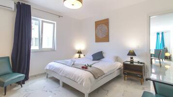 Family Apartment, Multiple Bedrooms, 2 Bathrooms (A Sunny Penthouse Modern 2 bdr -) | 2 bedrooms, iron/ironing board, free WiFi, bed sheets