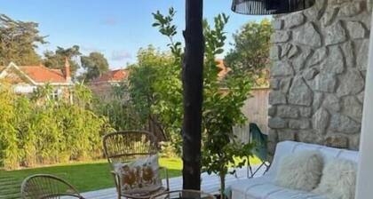 Villa avec piscine, centre SOULAC, 5 chambres, 12 personnes, jardin d'exception.