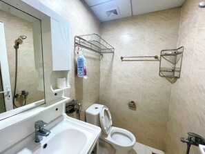 Standard Apartment | Bathroom | Hydromassage showerhead, designer toiletries, hair dryer, slippers - Muong Thanh Beachfront Apartment (Nha Trang)