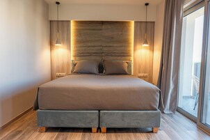 Suíte júnior | Quartos à prova de som, Wi-Fi de cortesia, roupa de cama