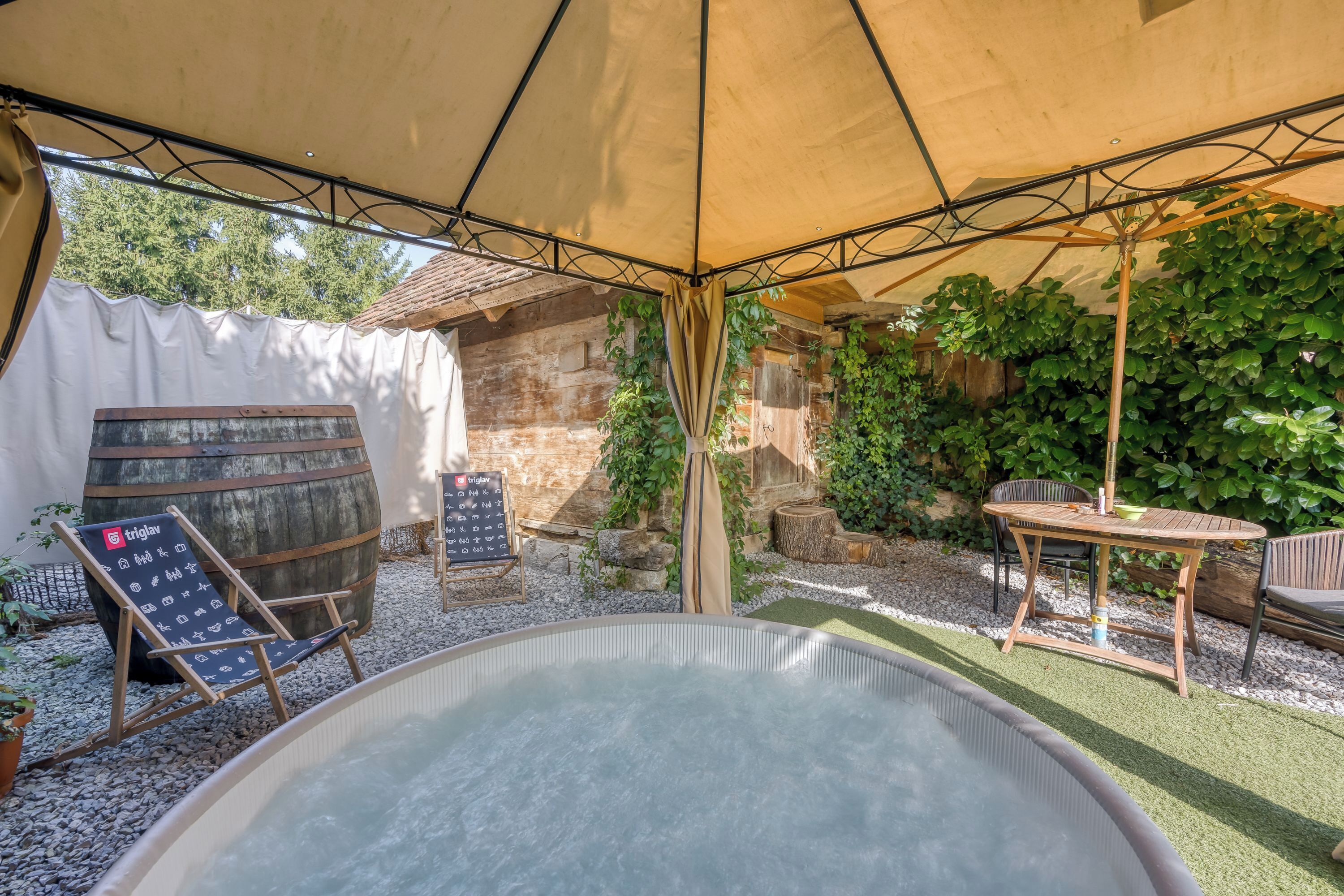 Family House, Multiple Bedrooms (Tiny-Mini Bertl With Hot Tub) | Outdoor spa tub
