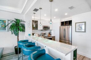 Fridge, microwave, oven, stovetop - Starboard Condo Summa (Merritt Island)