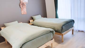 Habitación estándar con 2 camas individuales | 1 dormitorio, ropa de cama de alta calidad, edredones de plumas