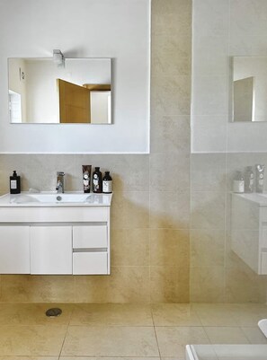 Hair dryer, towels, soap, toilet paper