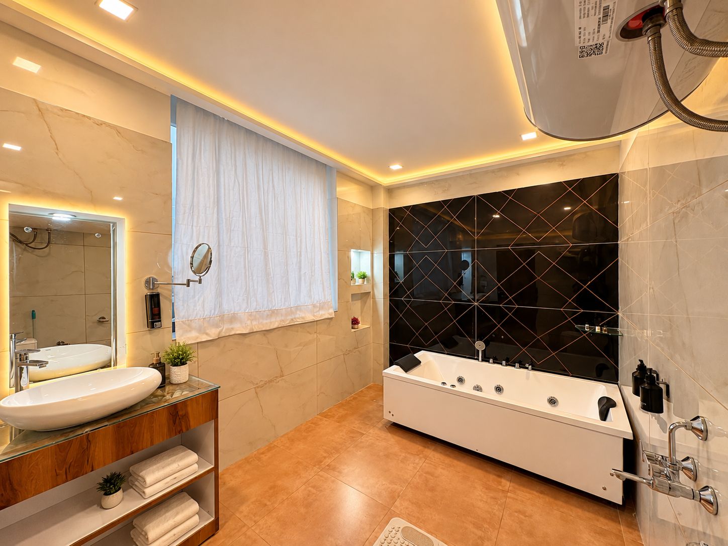 A modern bathroom with a large bathtub, a vanity with a mirror, and a shower area.
