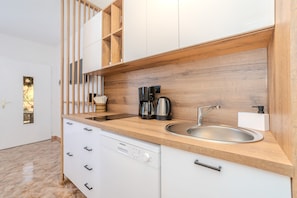 Classic Apartment, Garden View | Private kitchenette | Full-size fridge, microwave, dishwasher, electric kettle
