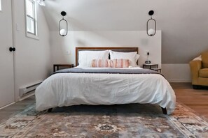 1 bedroom, desk, iron/ironing board, travel crib