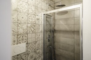 Shower, eco-friendly toiletries, hair dryer, bidet