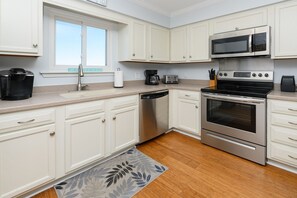Fridge, microwave, stovetop, dishwasher - Oceanfront 3 BR Condo! Seaside 401 - The Salty Vida (Surfside Beach)