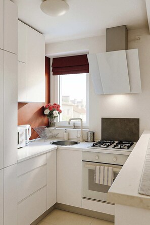 Refrigerador, microondas, horno y parrilla de estufa 