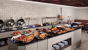 A buffet with various food items and beverages. - Courtyard by Marriott Casablanca Downtown (Casablanca)